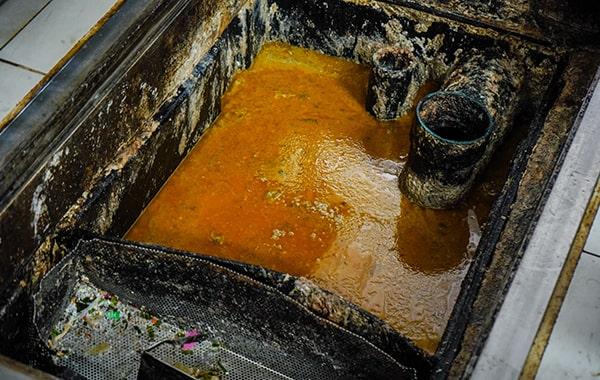 you should schedule grease trap cleaning for your restaurant a minimum of every 90 days to prevent build-up